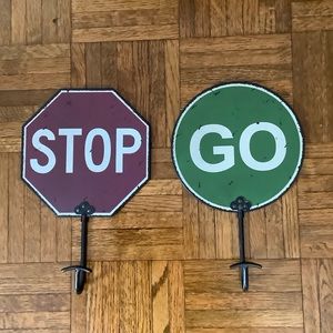 Weathered metal coat hooks